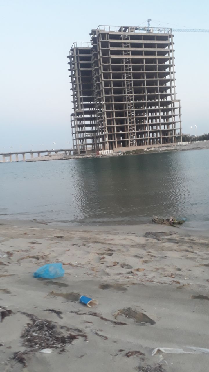 a building on the beach